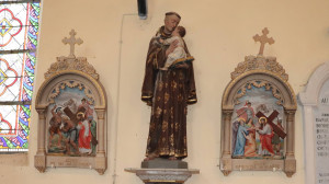 St Léger, church, statue (S)